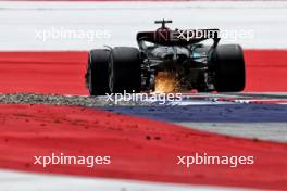 George Russell (GBR) Mercedes AMG F1 W15 sends sparks flying. 28.06.2024. Formula 1 World Championship, Rd 11, Austrian Grand Prix, Spielberg, Austria, Sprint Qualifying Day.