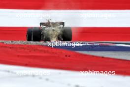 Lewis Hamilton (GBR) Mercedes AMG F1 W15 sends sparks flying. 28.06.2024. Formula 1 World Championship, Rd 11, Austrian Grand Prix, Spielberg, Austria, Sprint Qualifying Day.