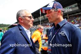 (L to R): Stefano Domenicali (ITA) Formula One President and CEO with Alex Wurz (AUT) GPDA Chairman on the grid. 30.06.2024. Formula 1 World Championship, Rd 11, Austrian Grand Prix, Spielberg, Austria, Race Day.