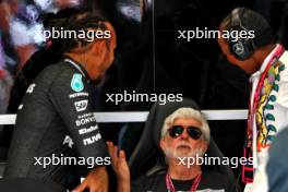Lewis Hamilton (GBR) Mercedes AMG F1 with George Lucas (USA) Star Wars Creator and his wife Mellody Hobson (USA). 30.06.2024. Formula 1 World Championship, Rd 11, Austrian Grand Prix, Spielberg, Austria, Race Day.
