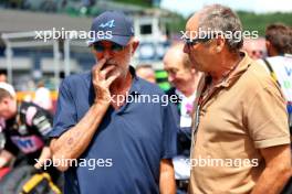(L to R): Flavio Briatore (ITA) Alpine F1 Team Executive Advisor with Gerhard Berger (AUT) on the grid. 30.06.2024. Formula 1 World Championship, Rd 11, Austrian Grand Prix, Spielberg, Austria, Race Day.