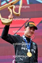 Race winner George Russell (GBR) Mercedes AMG F1 celebrates on the podium. 30.06.2024. Formula 1 World Championship, Rd 11, Austrian Grand Prix, Spielberg, Austria, Race Day.