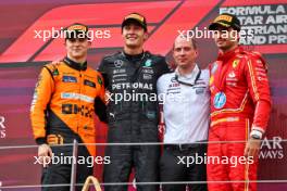 The podium (L to R): Oscar Piastri (AUS) McLaren, second; George Russell (GBR) Mercedes AMG F1, race winner; Marcus Dudley (GBR) Mercedes AMG F1 Race Engineer; Carlos Sainz Jr (ESP) Ferrari, third. 30.06.2024. Formula 1 World Championship, Rd 11, Austrian Grand Prix, Spielberg, Austria, Race Day.