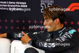 George Russell (GBR) Mercedes AMG F1 in the post race FIA Press Conference. 30.06.2024. Formula 1 World Championship, Rd 11, Austrian Grand Prix, Spielberg, Austria, Race Day.