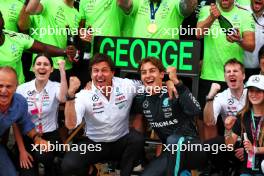 Race winner George Russell (GBR) Mercedes AMG F1 celebrates with Toto Wolff (GER) Mercedes AMG F1 Shareholder and Executive Director and the team after the race. 30.06.2024. Formula 1 World Championship, Rd 11, Austrian Grand Prix, Spielberg, Austria, Race Day.