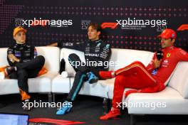 (L to R): Oscar Piastri (AUS) McLaren; George Russell (GBR) Mercedes AMG F1; and Carlos Sainz Jr (ESP) Ferrari, in the post race FIA Press Conference. 30.06.2024. Formula 1 World Championship, Rd 11, Austrian Grand Prix, Spielberg, Austria, Race Day.