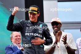 Race winner George Russell (GBR) Mercedes AMG F1 celebrates on the podium. 30.06.2024. Formula 1 World Championship, Rd 11, Austrian Grand Prix, Spielberg, Austria, Race Day.
