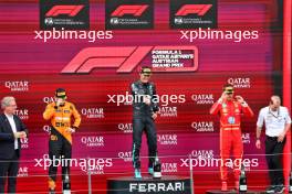The podium (L to R): Oscar Piastri (AUS) McLaren, second; George Russell (GBR) Mercedes AMG F1, race winner; Carlos Sainz Jr (ESP) Ferrari, third. 30.06.2024. Formula 1 World Championship, Rd 11, Austrian Grand Prix, Spielberg, Austria, Race Day.