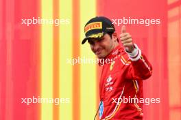 Carlos Sainz Jr (ESP) Ferrari celebrates his third position on the podium. 30.06.2024. Formula 1 World Championship, Rd 11, Austrian Grand Prix, Spielberg, Austria, Race Day.