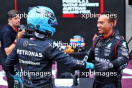 Race winner George Russell (GBR) Mercedes AMG F1 celebrates with the team in parc ferme. 30.06.2024. Formula 1 World Championship, Rd 11, Austrian Grand Prix, Spielberg, Austria, Race Day.