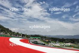 Zhou Guanyu (CHN) Sauber C44 and Fernando Alonso (ESP) Aston Martin F1 Team AMR24 collide. 30.06.2024. Formula 1 World Championship, Rd 11, Austrian Grand Prix, Spielberg, Austria, Race Day.