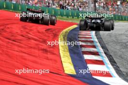 Nico Hulkenberg (GER) Haas VF-24 and Kevin Magnussen (DEN) Haas VF-24 battle for position. 30.06.2024. Formula 1 World Championship, Rd 11, Austrian Grand Prix, Spielberg, Austria, Race Day.