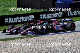 Esteban Ocon (FRA) Alpine F1 Team A524 and Pierre Gasly (FRA) Alpine F1 Team A524 battle for position. 30.06.2024. Formula 1 World Championship, Rd 11, Austrian Grand Prix, Spielberg, Austria, Race Day.