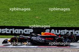 Max Verstappen (NLD) Red Bull Racing RB20 with a puncture. 30.06.2024. Formula 1 World Championship, Rd 11, Austrian Grand Prix, Spielberg, Austria, Race Day.