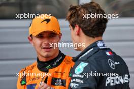 (L to R): Second placed Lando Norris (GBR) McLaren in qualifying parc ferme with third placed George Russell (GBR) Mercedes AMG F1. 29.06.2024. Formula 1 World Championship, Rd 11, Austrian Grand Prix, Spielberg, Austria, Sprint and Qualifying Day.