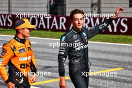 (L to R): second placed Lando Norris (GBR) McLaren with third placed George Russell (GBR) Mercedes AMG F1 in qualifying parc ferme. 29.06.2024. Formula 1 World Championship, Rd 11, Austrian Grand Prix, Spielberg, Austria, Sprint and Qualifying Day.