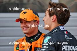(L to R): Second placed Lando Norris (GBR) McLaren in qualifying parc ferme with third placed George Russell (GBR) Mercedes AMG F1. 29.06.2024. Formula 1 World Championship, Rd 11, Austrian Grand Prix, Spielberg, Austria, Sprint and Qualifying Day.