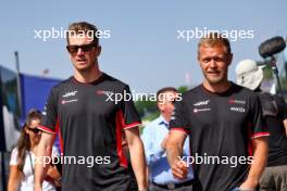 (L to R): Nico Hulkenberg (GER) Haas F1 Team with team mate Kevin Magnussen (DEN) Haas F1 Team. 29.06.2024. Formula 1 World Championship, Rd 11, Austrian Grand Prix, Spielberg, Austria, Sprint and Qualifying Day.