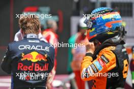 (L to R): Sprint winner Max Verstappen (NLD) Red Bull Racing in parc ferme with second placed Oscar Piastri (AUS) McLaren. 29.06.2024. Formula 1 World Championship, Rd 11, Austrian Grand Prix, Spielberg, Austria, Sprint and Qualifying Day.