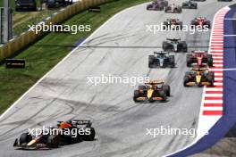 Max Verstappen (NLD) Red Bull Racing RB20 leads at the start of Sprint. 29.06.2024. Formula 1 World Championship, Rd 11, Austrian Grand Prix, Spielberg, Austria, Sprint and Qualifying Day.