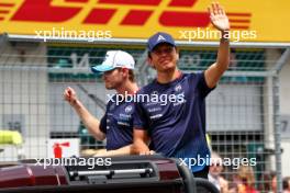 (L to R): Logan Sargeant (USA) Williams Racing and Alexander Albon (THA) Williams Racing on the drivers' parade. 30.06.2024. Formula 1 World Championship, Rd 11, Austrian Grand Prix, Spielberg, Austria, Race Day.