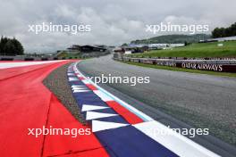 A gravel strip at the final corner to deter track limit infractions. 27.06.2024. Formula 1 World Championship, Rd 11, Austrian Grand Prix, Spielberg, Austria, Preparation Day.