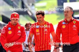 (L to R): Charles Leclerc (MON) Ferrari with Carlos Sainz Jr (ESP) Ferrari and Diego Ioverno (ITA) Ferrari Sporting Director. 27.06.2024. Formula 1 World Championship, Rd 11, Austrian Grand Prix, Spielberg, Austria, Preparation Day.