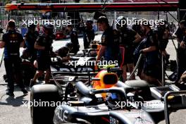 Max Verstappen (NLD) Red Bull Racing RB20 and Sergio Perez (MEX) Red Bull Racing RB20 in the pits. 13.09.2024. Formula 1 World Championship, Rd 17, Azerbaijan Grand Prix, Baku Street Circuit, Azerbaijan, Practice Day.