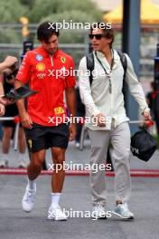 (L to R): Carlos Sainz Jr (ESP) Ferrari with Roberto Mehri (ESP). 13.09.2024. Formula 1 World Championship, Rd 17, Azerbaijan Grand Prix, Baku Street Circuit, Azerbaijan, Practice Day.