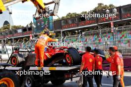 The Ferrari SF-24 of Charles Leclerc (MON) Ferrari, who crashed in the first practice session, is recovered back to the pits on the back of a truck. 13.09.2024. Formula 1 World Championship, Rd 17, Azerbaijan Grand Prix, Baku Street Circuit, Azerbaijan, Practice Day.