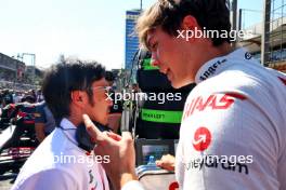 (L to R): Ayao Komatsu (JPN) Haas F1 Team Principal with Oliver Bearman (GBR) Haas F1 Team on the grid. 15.09.2024. Formula 1 World Championship, Rd 17, Azerbaijan Grand Prix, Baku Street Circuit, Azerbaijan, Race Day.