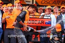 Race winner Oscar Piastri (AUS) McLaren celebrates with team mate Lando Norris (GBR) McLaren and the team. 15.09.2024. Formula 1 World Championship, Rd 17, Azerbaijan Grand Prix, Baku Street Circuit, Azerbaijan, Race Day.