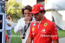 Carlos Sainz Jr (ESP) Ferrari with Roberto Mehri (ESP). 15.09.2024. Formula 1 World Championship, Rd 17, Azerbaijan Grand Prix, Baku Street Circuit, Azerbaijan, Race Day.