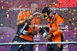 Race winner Oscar Piastri (AUS) McLaren celebrates on the podium with Tom Stallard (GBR) McLaren Race Engineer. 15.09.2024. Formula 1 World Championship, Rd 17, Azerbaijan Grand Prix, Baku Street Circuit, Azerbaijan, Race Day.