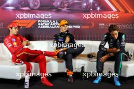 (L to R): Charles Leclerc (MON) Ferrari; Oscar Piastri (AUS) McLaren; and George Russell (GBR) Mercedes AMG F1 in the post race FIA Press Conference. 15.09.2024. Formula 1 World Championship, Rd 17, Azerbaijan Grand Prix, Baku Street Circuit, Azerbaijan, Race Day.