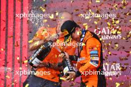 Race winner Oscar Piastri (AUS) McLaren celebrates on the podium with Tom Stallard (GBR) McLaren Race Engineer. 15.09.2024. Formula 1 World Championship, Rd 17, Azerbaijan Grand Prix, Baku Street Circuit, Azerbaijan, Race Day.