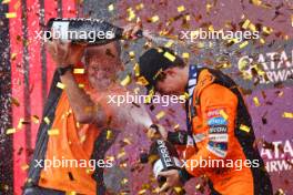 Race winner Oscar Piastri (AUS) McLaren celebrates on the podium with Tom Stallard (GBR) McLaren Race Engineer. 15.09.2024. Formula 1 World Championship, Rd 17, Azerbaijan Grand Prix, Baku Street Circuit, Azerbaijan, Race Day.