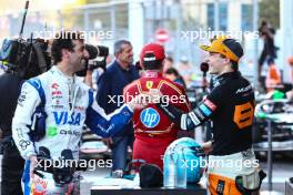 Oscar Piastri (AUS), McLaren Daniel Ricciardo (AUS), RB F1 Team  15.09.2024. Formula 1 World Championship, Rd 17, Azerbaijan Grand Prix, Baku Street Circuit, Azerbaijan, Race Day.