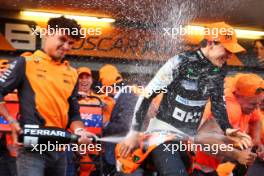 Race winner Oscar Piastri (AUS) McLaren celebrates with team mate Lando Norris (GBR) McLaren and the team. 15.09.2024. Formula 1 World Championship, Rd 17, Azerbaijan Grand Prix, Baku Street Circuit, Azerbaijan, Race Day.