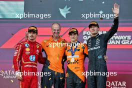 The podium (L to R): Charles Leclerc (MON) Ferrari, second; Tom Stallard (GBR) McLaren Race Engineer; Oscar Piastri (AUS) McLaren, race winner; George Russell (GBR) Mercedes AMG F1, third. 15.09.2024. Formula 1 World Championship, Rd 17, Azerbaijan Grand Prix, Baku Street Circuit, Azerbaijan, Race Day.