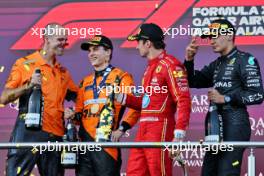 The podium (L to R): Tom Stallard (GBR) McLaren Race Engineer; Charles Leclerc (MON) Ferrari, second; Oscar Piastri (AUS) McLaren, race winner; George Russell (GBR) Mercedes AMG F1, third. 15.09.2024. Formula 1 World Championship, Rd 17, Azerbaijan Grand Prix, Baku Street Circuit, Azerbaijan, Race Day.