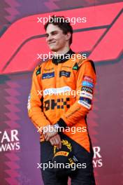 Race winner Oscar Piastri (AUS) McLaren celebrates on the podium. 15.09.2024. Formula 1 World Championship, Rd 17, Azerbaijan Grand Prix, Baku Street Circuit, Azerbaijan, Race Day.