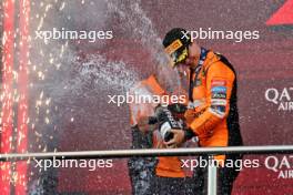 Race winner Oscar Piastri (AUS) McLaren celebrates on the podium with Tom Stallard (GBR) McLaren Race Engineer. 15.09.2024. Formula 1 World Championship, Rd 17, Azerbaijan Grand Prix, Baku Street Circuit, Azerbaijan, Race Day.