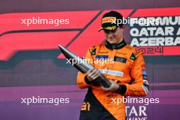 Race winner Oscar Piastri (AUS) McLaren celebrates on the podium. 15.09.2024. Formula 1 World Championship, Rd 17, Azerbaijan Grand Prix, Baku Street Circuit, Azerbaijan, Race Day.