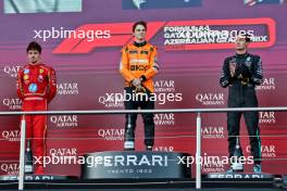 The podium (L to R): Charles Leclerc (MON) Ferrari, second; Oscar Piastri (AUS) McLaren, race winner; George Russell (GBR) Mercedes AMG F1, third. 15.09.2024. Formula 1 World Championship, Rd 17, Azerbaijan Grand Prix, Baku Street Circuit, Azerbaijan, Race Day.