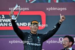 George Russell (GBR) Mercedes AMG F1 celebrates his third position on the podium. 15.09.2024. Formula 1 World Championship, Rd 17, Azerbaijan Grand Prix, Baku Street Circuit, Azerbaijan, Race Day.