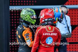 (L to R): Lando Norris (GBR) McLaren MCL38 with Charles Leclerc (MON) Ferrari in parc ferme. 15.09.2024. Formula 1 World Championship, Rd 17, Azerbaijan Grand Prix, Baku Street Circuit, Azerbaijan, Race Day.