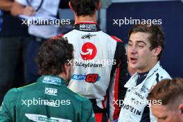 Franco Colapinto (ARG) Williams Racing in parc ferme with Fernando Alonso (ESP) Aston Martin F1 Team. 15.09.2024. Formula 1 World Championship, Rd 17, Azerbaijan Grand Prix, Baku Street Circuit, Azerbaijan, Race Day.