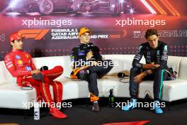 (L to R): Charles Leclerc (MON) Ferrari; Oscar Piastri (AUS) McLaren; and George Russell (GBR) Mercedes AMG F1 in the post race FIA Press Conference. 15.09.2024. Formula 1 World Championship, Rd 17, Azerbaijan Grand Prix, Baku Street Circuit, Azerbaijan, Race Day.