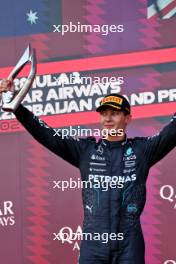 George Russell (GBR) Mercedes AMG F1 celebrates his third position on the podium. 15.09.2024. Formula 1 World Championship, Rd 17, Azerbaijan Grand Prix, Baku Street Circuit, Azerbaijan, Race Day.